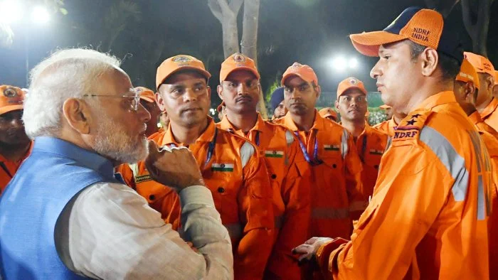 NDRF Rescuers with PM Modi